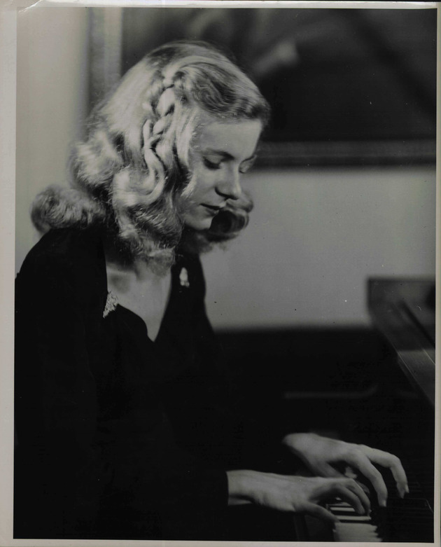 Barbara Hannon playing piano